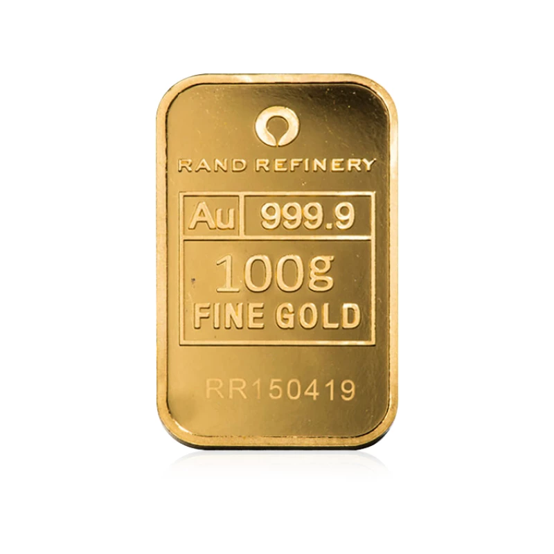100g gold bar on a plain surface.